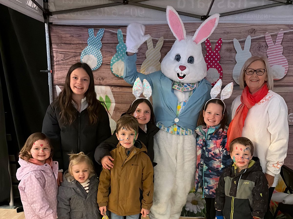 Sue with her grandchildren at a community Easter event
